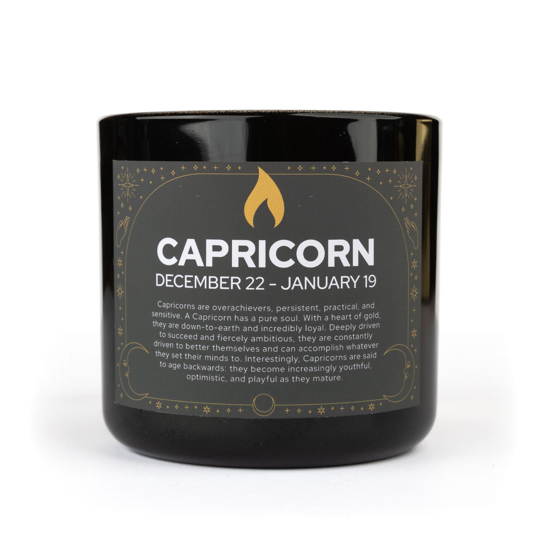 Capricorn zodiac candle in black jar with gold label- amber musk home fragrance