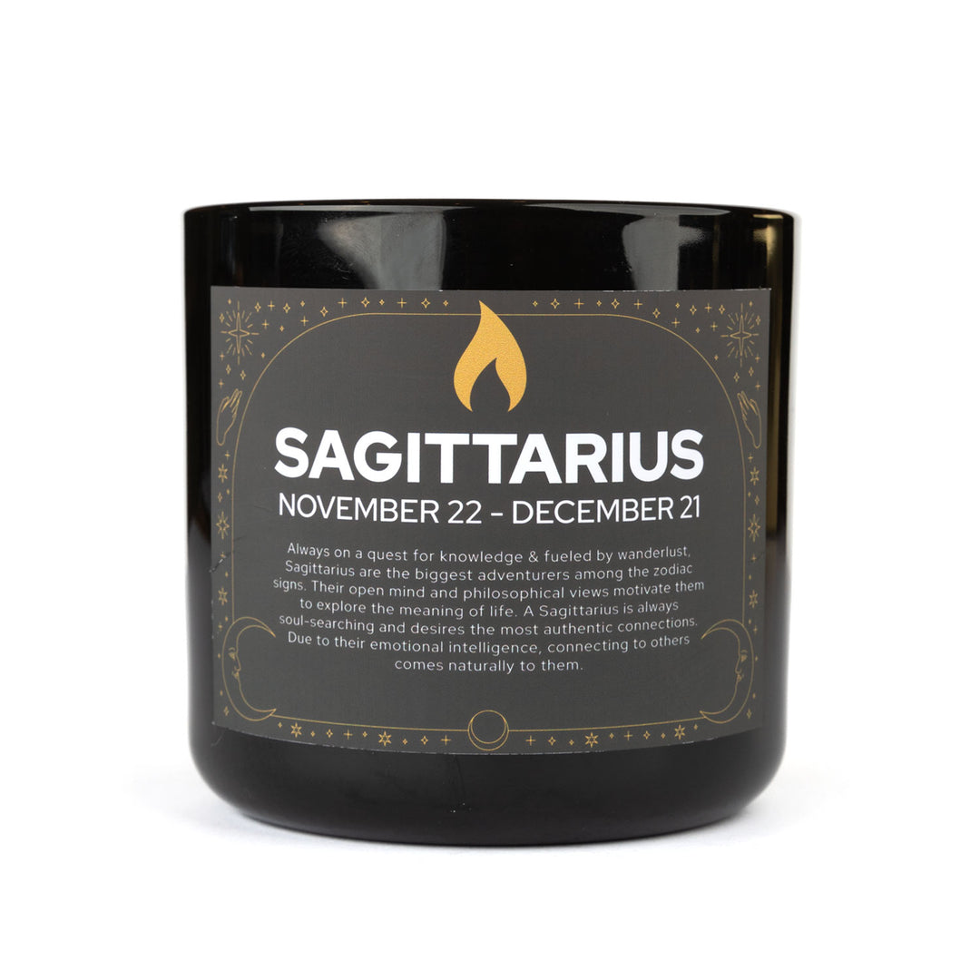Sagittarius zodiac candle in a black jar with gold label - amber noir fragrance