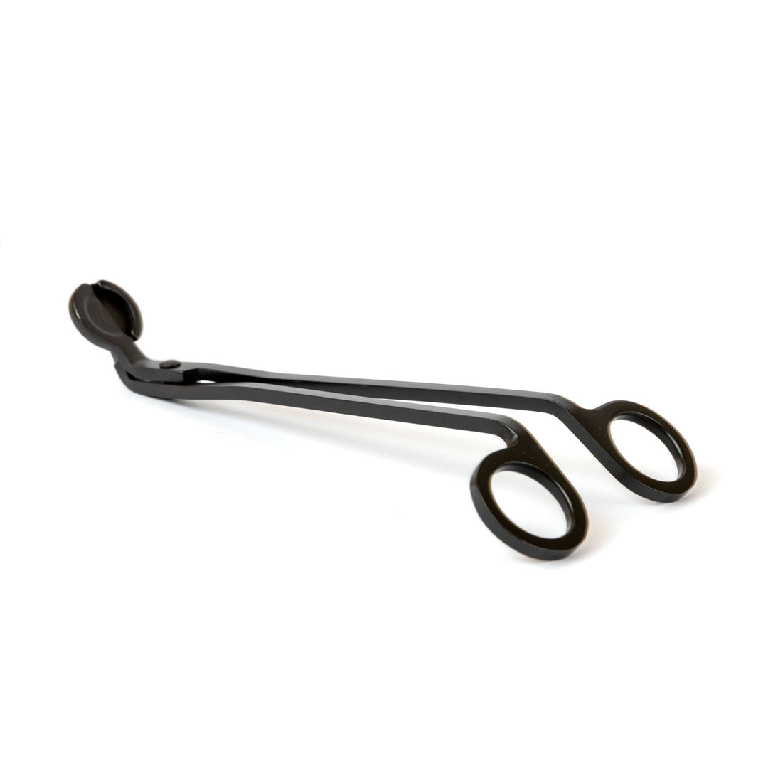 Black metal wick trimmer for candles, designed to keep wicks at the perfect length, prevent soot, and enhance room fragrance, home fragrance, and home scent.